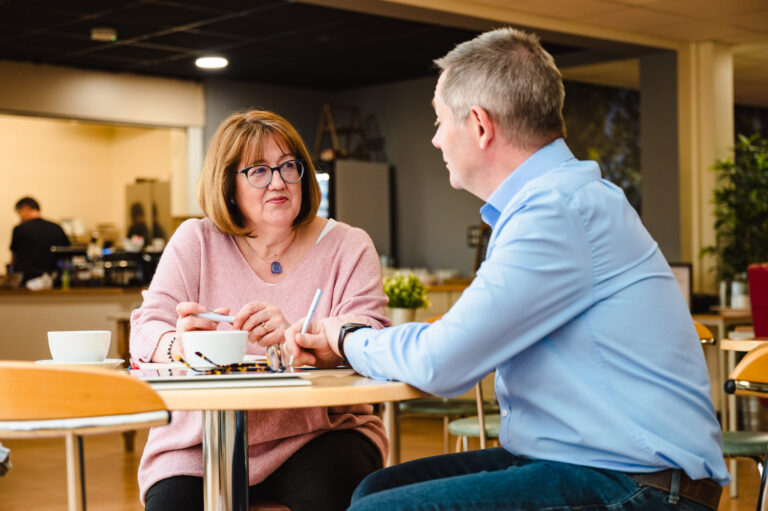 Rupert and Angela from Action coach having a meeting